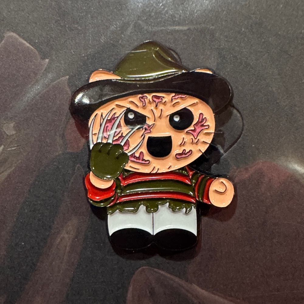 3 for $15 on select pins
 Horror-Themed Bear Pin - Multicolor